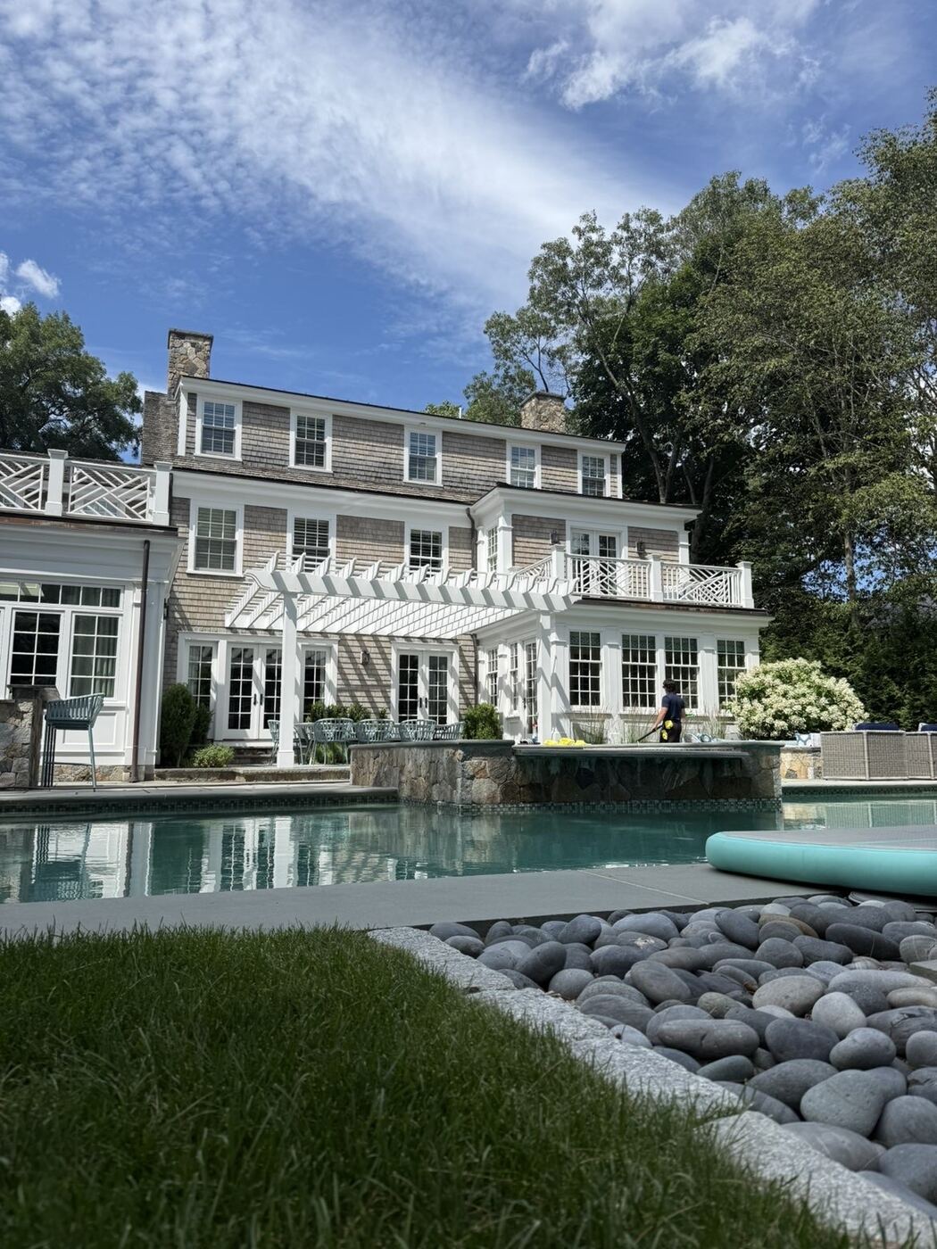 Poolside exterior of a Wellesley home